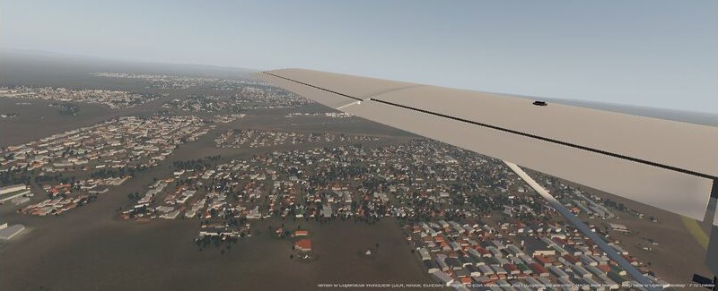 The view past the wing over the East Rand